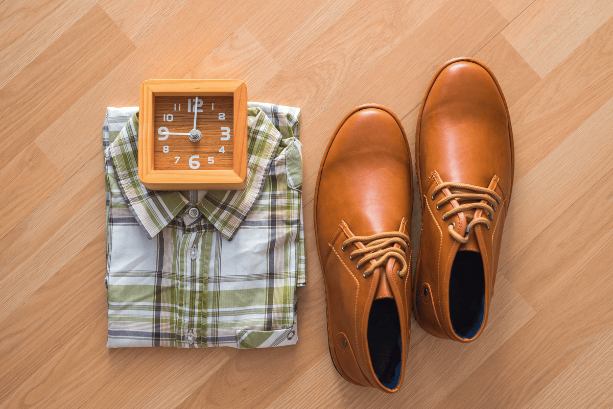 flat-lay-men-s-casual-fashion-brown-wooden-floor-background